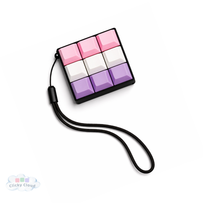Colorful keycap keychain fidget set with a lanyard on a white background
