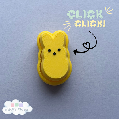 Yellow bunny peep  with 'Click Click!' text on a blue background