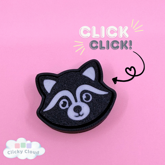 Raccoon-shaped button with 'Click Click!' text on a pink background
