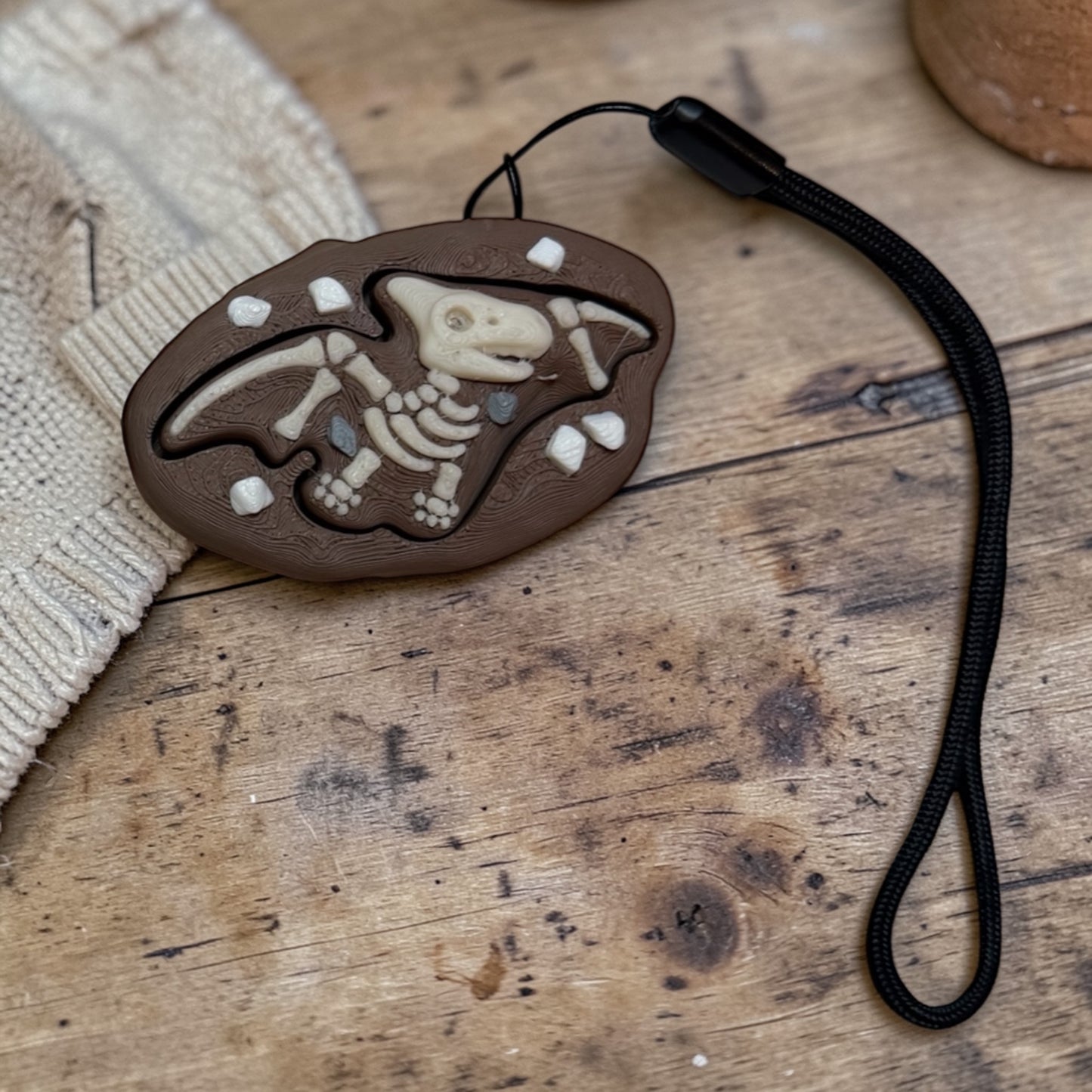 dinosaur fossil fidget clicker